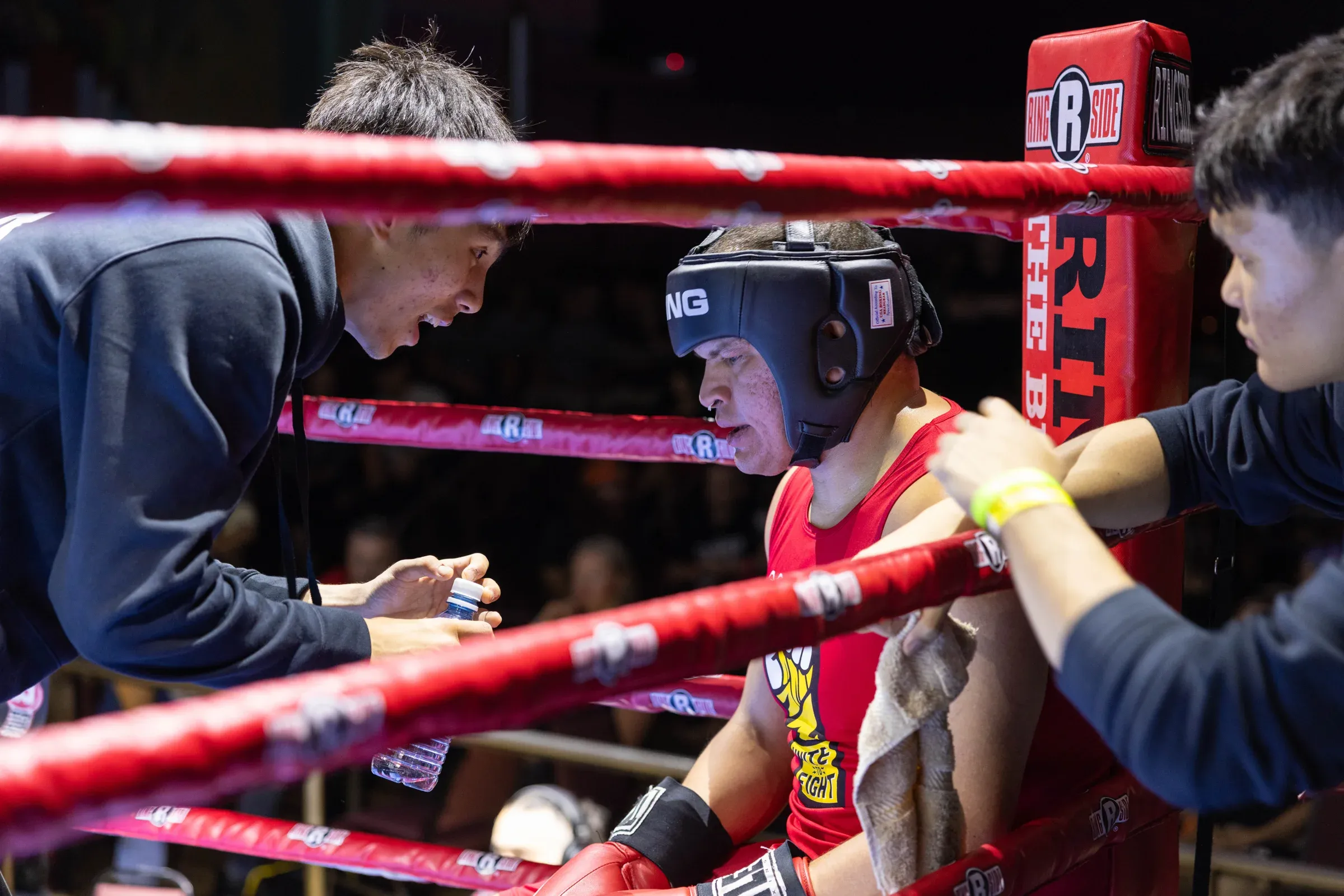 A boxer's corner working between rounds at a Corner fight night