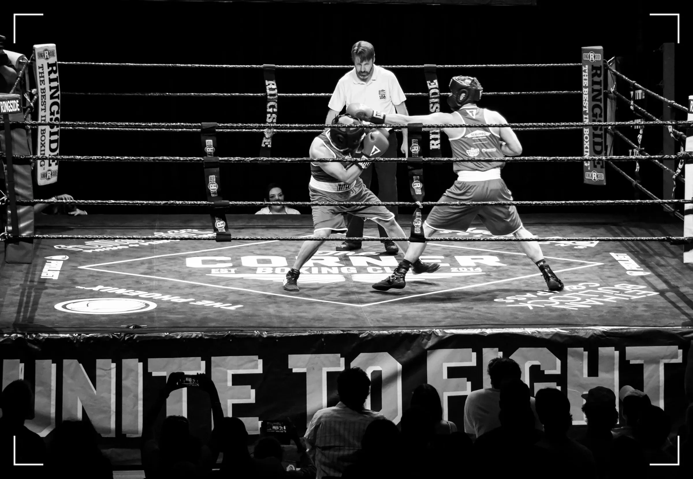 The Unite to Fight ring surrounded by a packed crowd