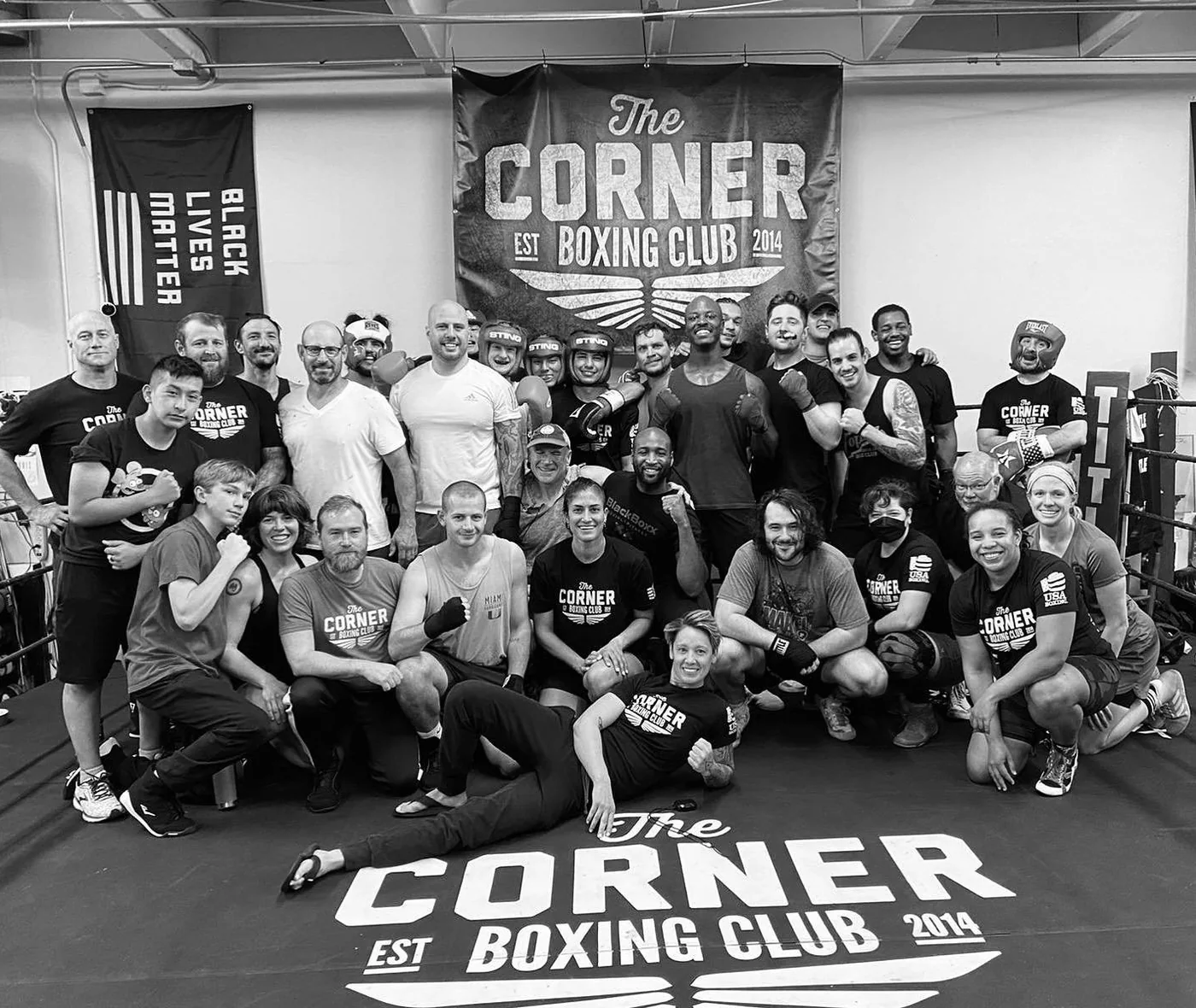 The Corner Boxing Club community gathered under their gym banner